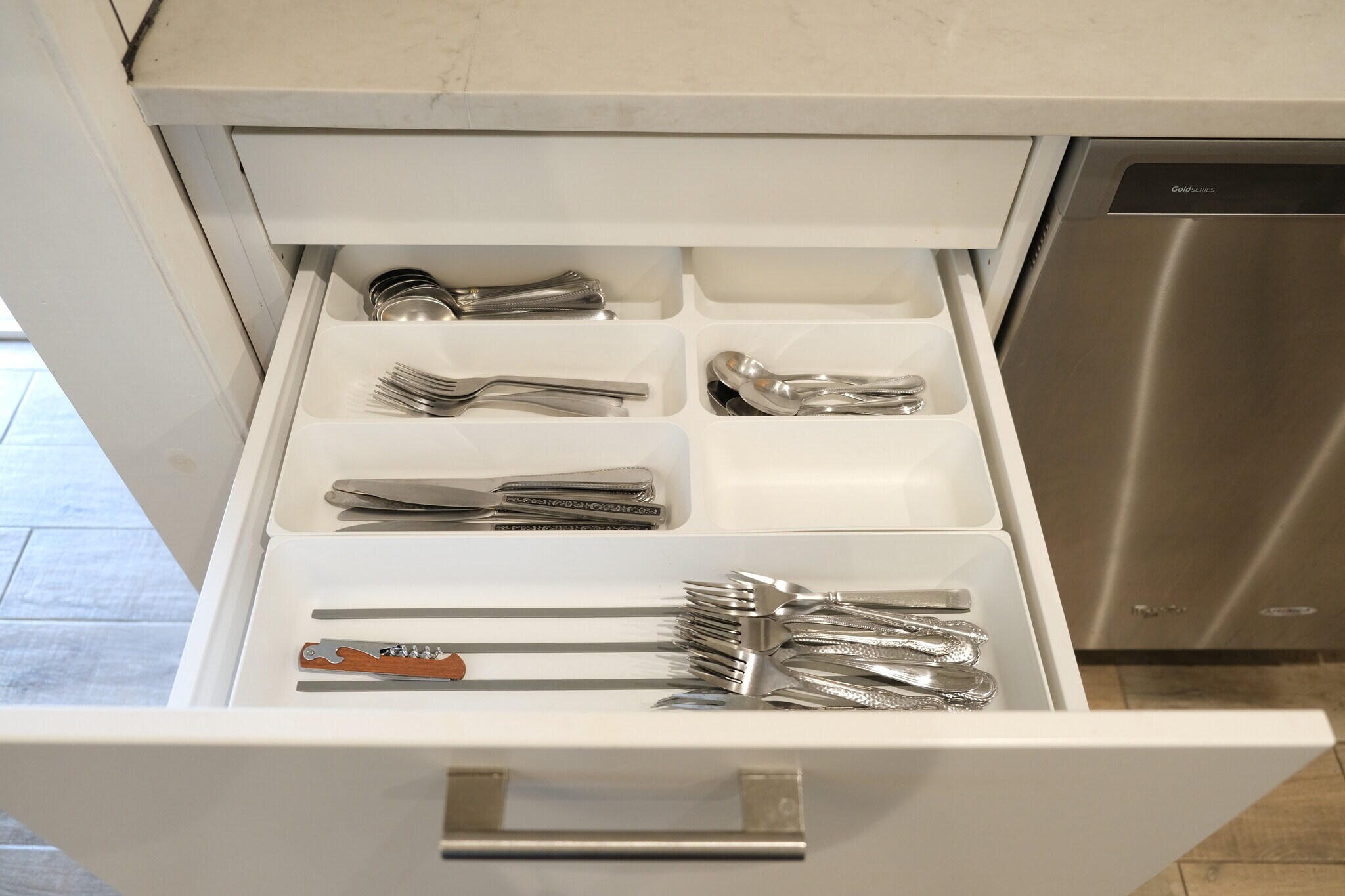 Kitchen drawers come with utensils - 1243 N Alexandria Ave