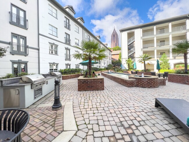 Courtyard with grills & seating - 240 North Ave NE