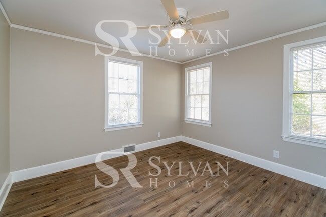 Building Photo - The living is easy in this 3 bedroom, 2 bathroom brick home