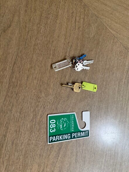 One car garage parking with storage and one parking pass for on property only - 1441 Prospect Ave
