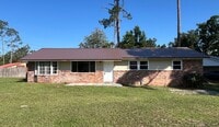 Building Photo - Charming 4-Bedroom Brick Home on Spacious ...