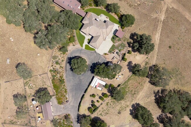 Building Photo - Private Gated Mini-Ranch • 7+ Acres • Luxury Country Living • Indoor Pool • Horses Welcome