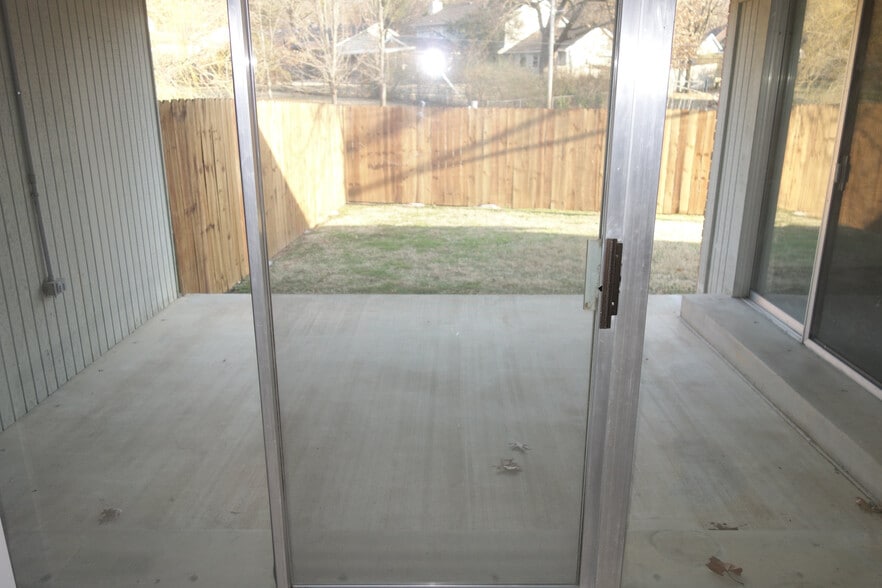 2nd bedroom view to backyard and covered back patio - 3324 E 73rd St