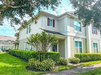 Building Photo - Spacious 4-Bedroom Townhome in Harmony – A Perfect Blend of Nature & Comfort!