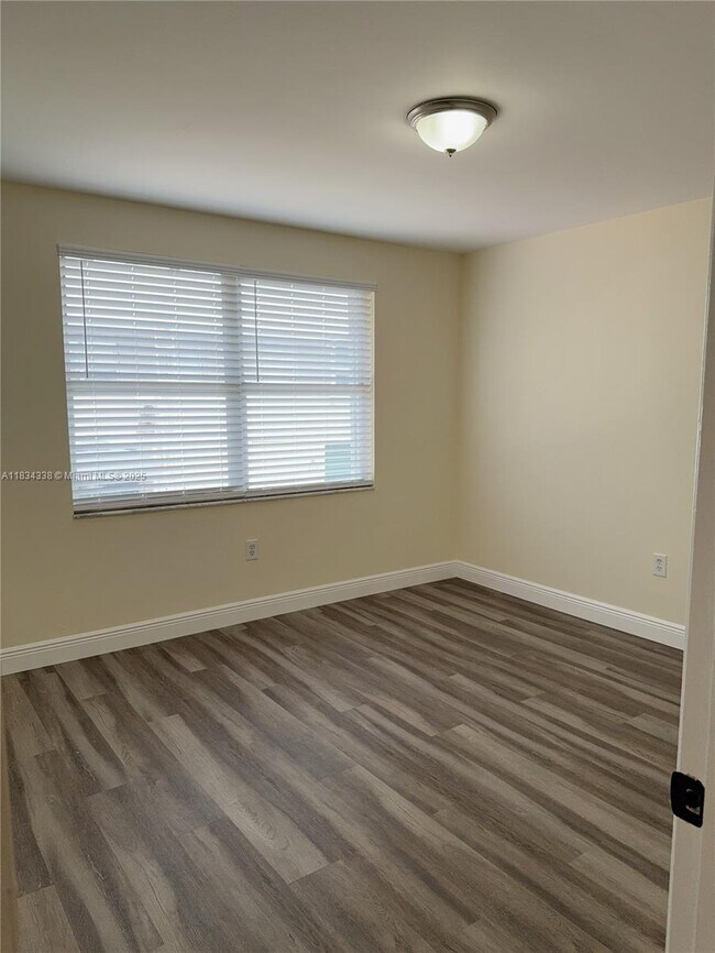 Building Photo - 5490 NW 92nd Ave