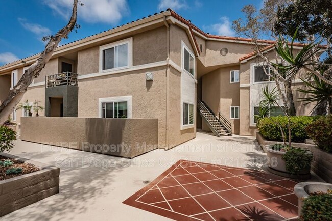 Building Photo - 7565 Charmant Dr