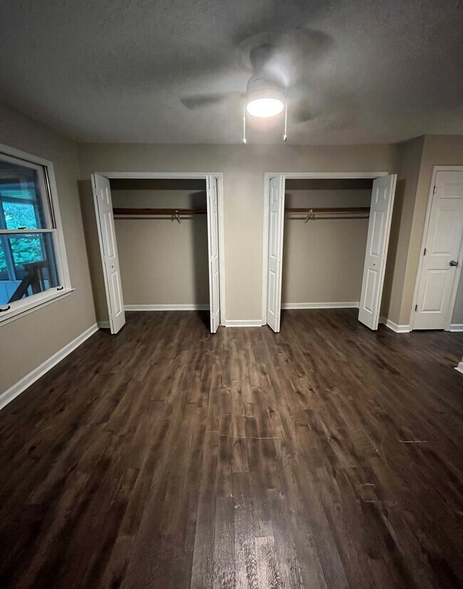Main floor master bedroom - double closets and storage closet - 440 Williamsburg Way
