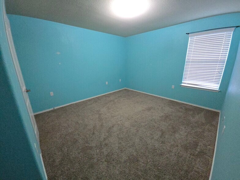 Bedroom 2 - will be painted in neutrals - 10116 Deer Chase Trl