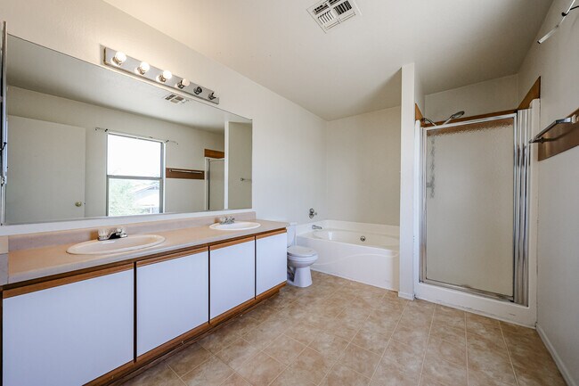 Building Photo - 11816 W Rosewood Dr