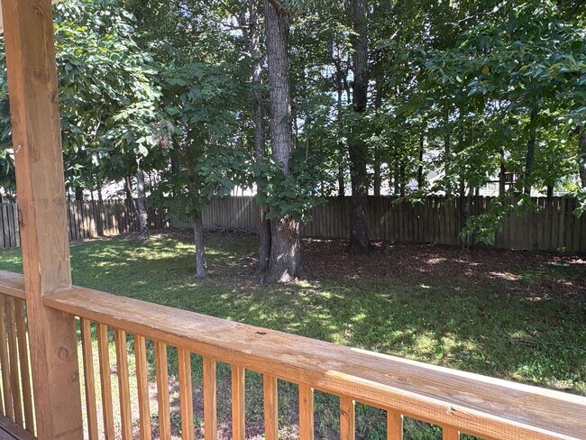 Building Photo - Charming Home with Covered Back Deck and Fenced in Yard...