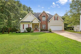 Building Photo - Spacious 5BR Home with Bonus Room & Private Backyard in Stockbridge