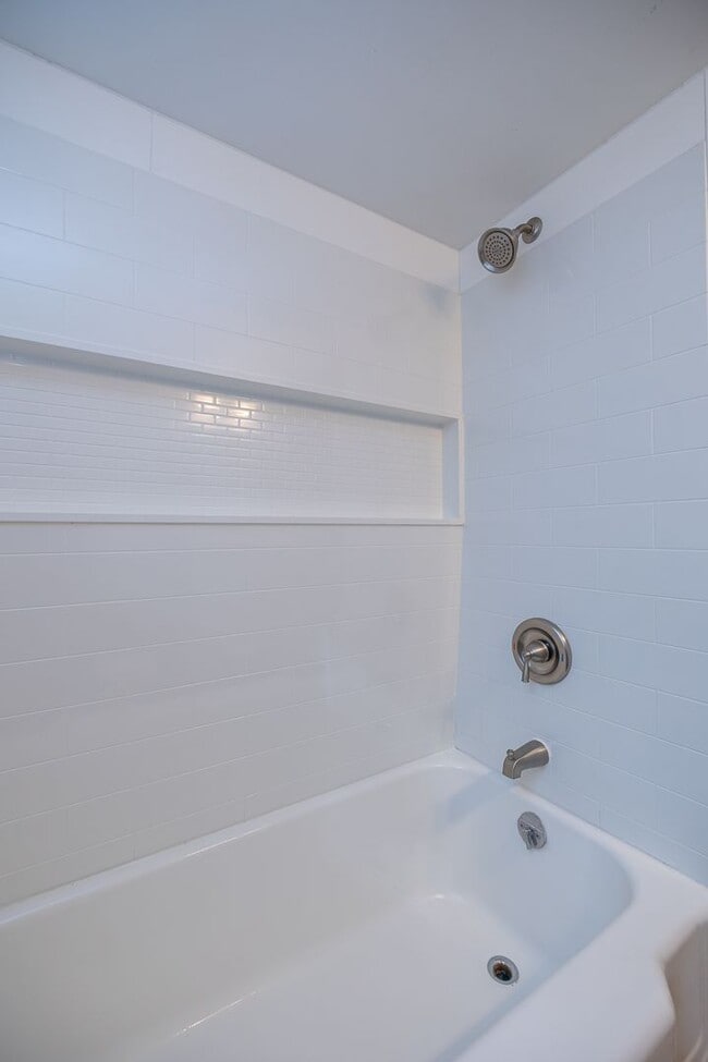 Building Photo - Newly Renovated - Spacious 4 Bedroom - 2 B...