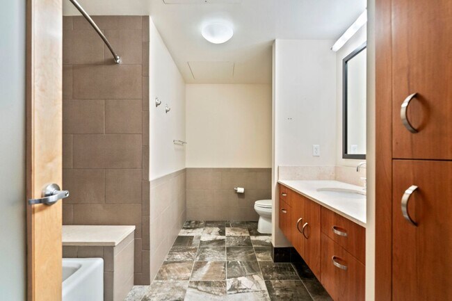 Building Photo - Elizabeth Lofts - 7th floor west facing Pearl District studio w/parking/concierge/most utilities