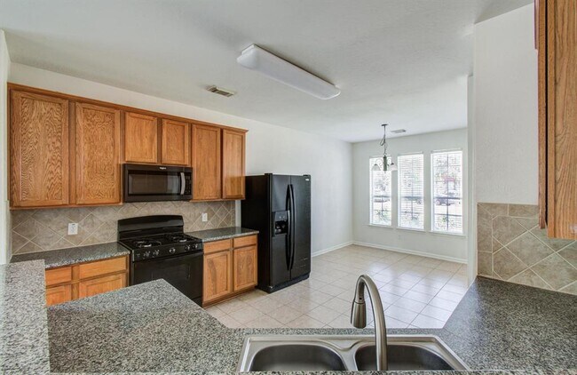Building Photo - 7547 Oakwood Canyon Dr