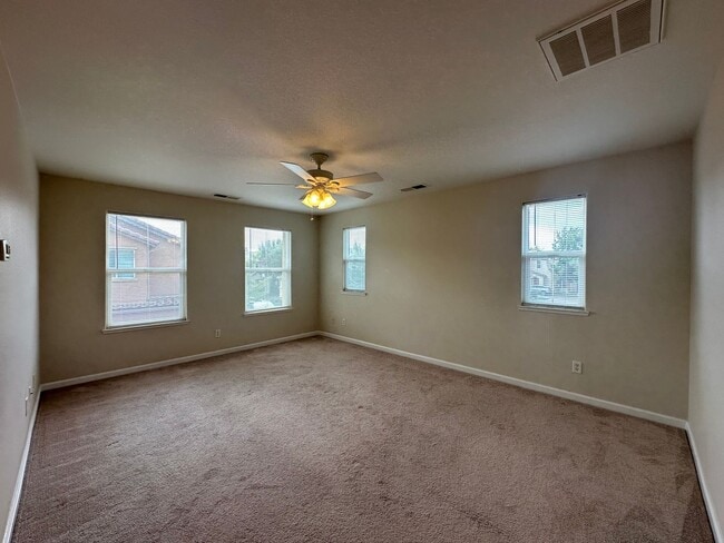 Building Photo - Three Bedroom Corner Lot Home