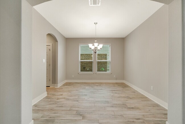 Building Photo - 8325 Paola St