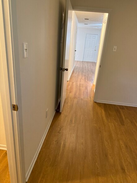 View from back bedroom towards front door of unit - 7000 Oak Meadow Cir