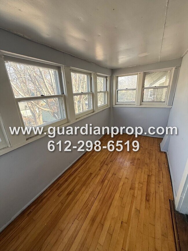 Building Photo - Merriam Park House Available May 1st, Updated Kitchen, Office, Fenced Yard, 2 Car Garage