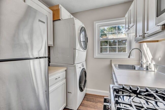 Building Photo - Utilities Included! Updated 2-Bedroom Condo Just Steps from Huntington Metro