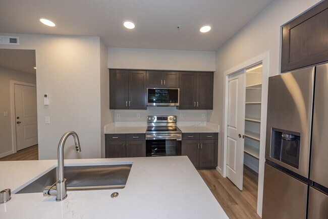 Building Photo - Brand New! - 2 Bedr in Gated Community - Free xfinity Internet