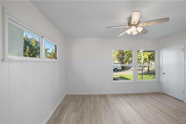 Building Photo - Welcome to this inviting 3 bedroom, 2 bath residence tucked away on a peaceful street in the hear...