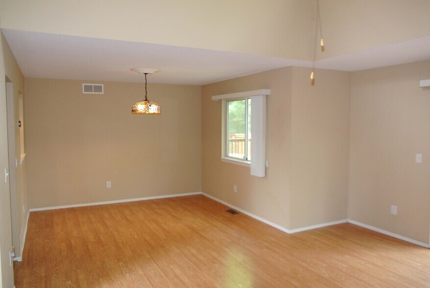 Dining Room with Wooded View - 6649 Quail Run Cir