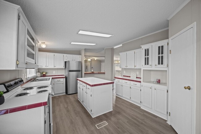 Building Photo - Charming 4-Bedroom Home on Spacious 2.64-Acre Lot in Graham, NC