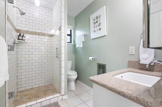 Building Photo - 3 Bed, 3 Bath Home with Expansive Kitchen, Two Living Areas & Private Suite
