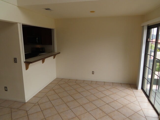 Building Photo - Three Bedroom Townhome with Two-Car Garage