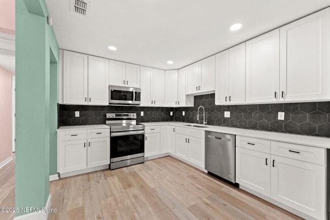 Building Photo - 5217 Witby Ave
