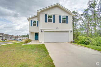 Building Photo - Spacious 4BR Home with 2-Car Garage Near M...