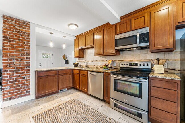 Building Photo - Beautiful Open Concept Brick Ranch blocks ...