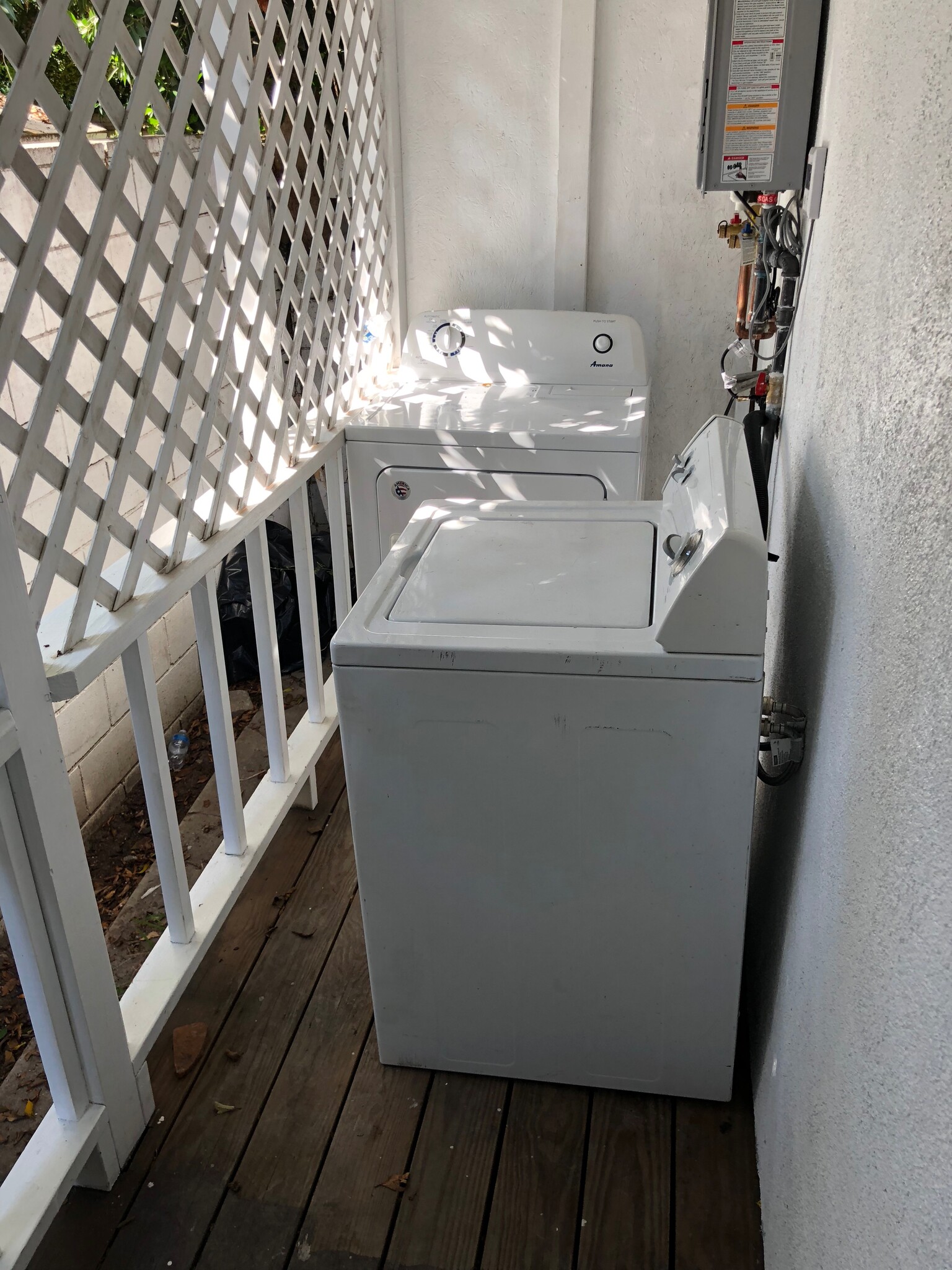 Washer/dryer on back patio - 719 N Formosa Ave