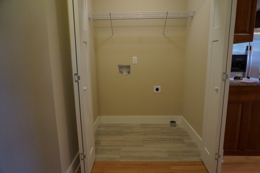 Tiled laundry closet in hallway - 3199 Concord Circle