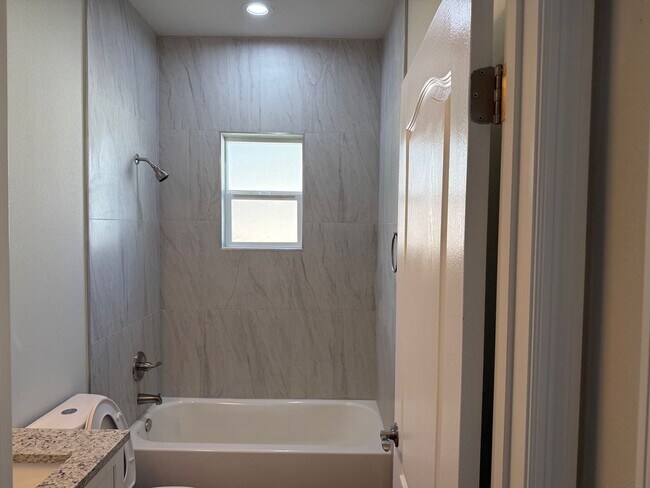 Building Photo - Brand New 3 Bedroom, 2 Bathroom Townhome with 1-Car Garage, Screened Porch & FULLY PRIVATE Fenced...