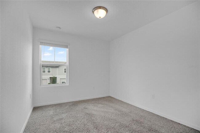 Building Photo - 2026 Crape Jasmine Ln