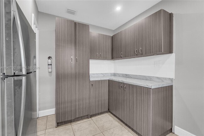 Building Photo - 6940 NW 6th Ct