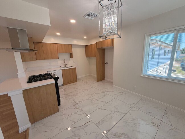 Building Photo - Completely Remodeled, Spacious 2 Bedroom Apartment For Rent w/ Parking!