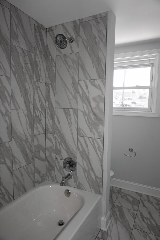 Building Photo - Completely Renovated 3 Bedroom w/ Garage i...