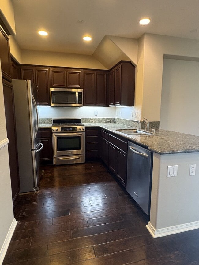 Building Photo - Tri-Level Condo within Walking Distance to...
