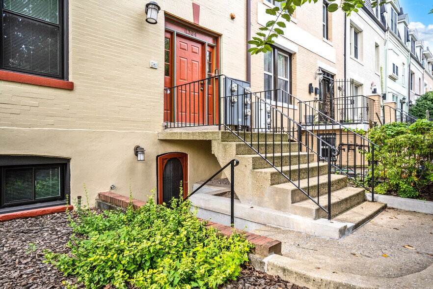 Front of building with unit entry below - 1304 Belmont St NW