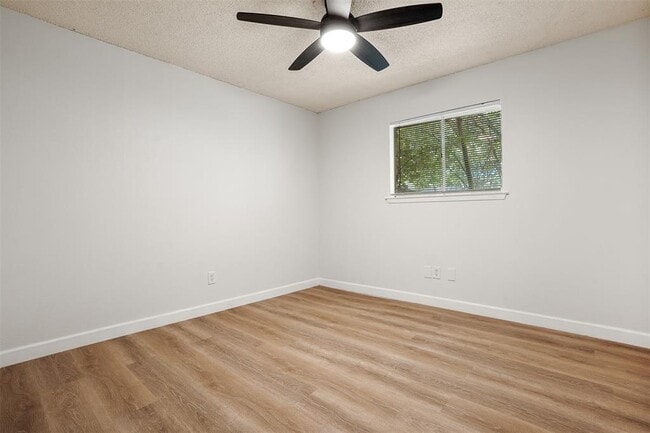 Building Photo - 8603 Woodstone Dr