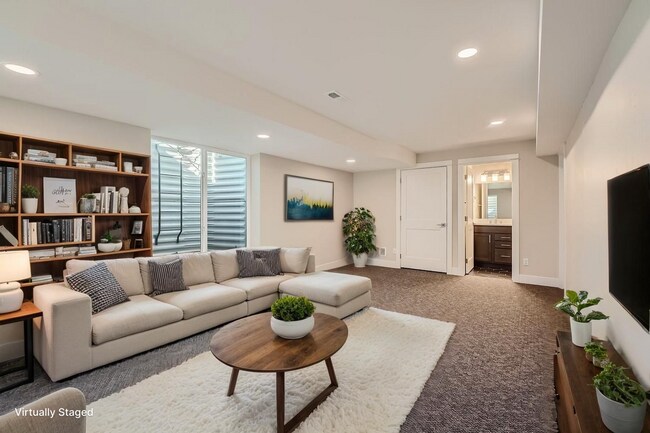 Building Photo - Modern 4BR Townhome Near Sloan’s Lake | Rooftop Deck, Finished Basement & Garage