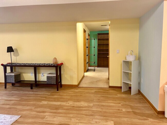 Building Photo - Spacious Garden-level Condo with Kitchenet...