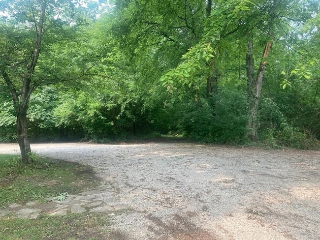 Building Photo - Beautiful Duplex Located in Serene, Wooded...
