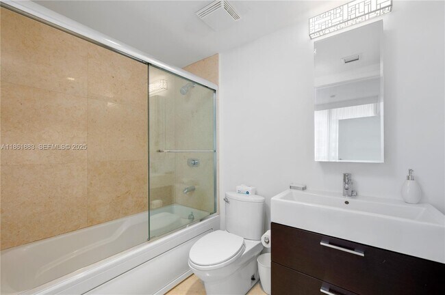 Building Photo - 5875 Collins Ave