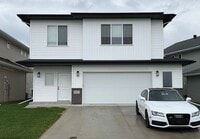 Building Photo - 4-bedroom, 3-bathroom South Fargo Single-Family Home w/ 2 Stall Garage