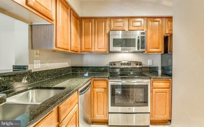 Building Photo - Stylish Condo with Premium Location