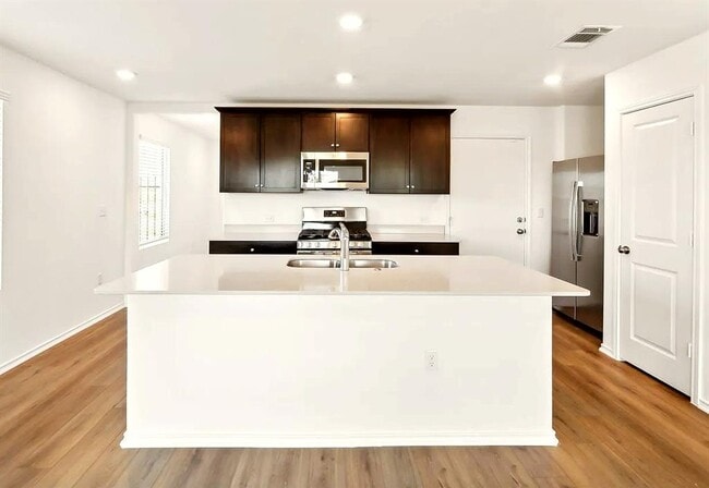 Building Photo - 7108 Spotted Leaf Way