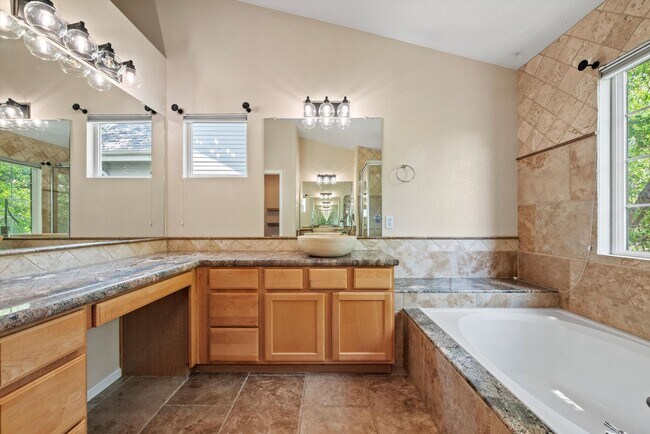 Building Photo - Stunning Tennyson Park Home | 4 Bedrooms, Finished Basement & Open Space Views